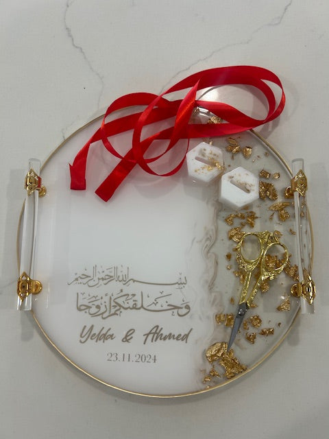 white and gold round engagement tray